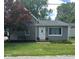 Charming home with gray siding, well-maintained lawn, and inviting front entrance at 335 Park St, Noblesville, IN 46060