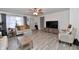 Inviting living room with a large window, stylish decor, and comfortable seating at 335 Park St, Noblesville, IN 46060