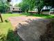 Large backyard with trees, a basketball hoop, and a storage shed creates a versatile outdoor space at 336 N Windsong Ln, Greenwood, IN 46142