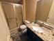 Bathroom with granite countertop, stainless faucet, shower stall, and tile floor at 336 N Windsong Ln, Greenwood, IN 46142