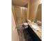 Bathroom with granite countertop, stainless faucet, shower stall, and tile floor at 336 N Windsong Ln, Greenwood, IN 46142