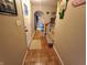Inviting entryway boasting stylish parquet floors and arched doorways at 336 N Windsong Ln, Greenwood, IN 46142