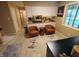 Bright kitchen with white cabinets, tan counter tops, and comfortable seating space for Gathering or guests at 336 N Windsong Ln, Greenwood, IN 46142