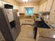 Efficient kitchen features granite countertops, stainless steel appliances, and ample cabinet space at 336 N Windsong Ln, Greenwood, IN 46142
