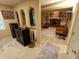 Open living room with fireplace, ample seating, and a sliding glass door at 336 N Windsong Ln, Greenwood, IN 46142