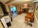 Spacious living room with hardwood floors, fireplace, and sliding glass doors to the yard at 336 N Windsong Ln, Greenwood, IN 46142