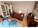 Office area with a large desk, cabinets, and modern decor at 336 N Windsong Ln, Greenwood, IN 46142