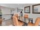 Dining room view with seating for four adjacent to the staircase, with an overhead light fixture at 3546 Brampton Ln, Westfield, IN 46074