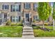 Inviting front entrance featuring a concrete stairway, manicured lawn, and freshly planted ornamental trees at 3546 Brampton Ln, Westfield, IN 46074