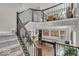 View of the open-concept home with a game room featuring a pool table and a staircase to the second floor at 3546 Brampton Ln, Westfield, IN 46074
