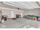 Large garage with an abundance of storage space, featuring two doors and ample room for vehicles and equipment at 3546 Brampton Ln, Westfield, IN 46074