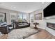 Bright living room with fireplace, a large window, and comfortable seating at 3546 Brampton Ln, Westfield, IN 46074