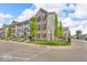 Beautifully maintained townhomes featuring brick and siding exteriors with well-manicured lawns and tree lined streets at 3546 Brampton Ln, Westfield, IN 46074