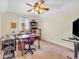Versatile carpeted room with a ceiling fan and a window perfect for an office or hobby space at 3559 Towne Dr, Carmel, IN 46032