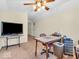 Versatile carpeted room with a ceiling fan and a window perfect for an office or hobby space at 3559 Towne Dr, Carmel, IN 46032