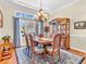 Elegant dining room with traditional furnishings, chandelier, and natural light at 3559 Towne Dr, Carmel, IN 46032