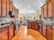 Well-appointed kitchen featuring stainless steel appliances, granite countertops, and custom cabinetry at 3559 Towne Dr, Carmel, IN 46032