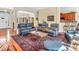 Spacious living room with ample seating, wood floors, and an open layout perfect for gatherings at 3559 Towne Dr, Carmel, IN 46032