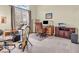 Functional home office with a desk, ample workspace, and natural light, perfect for productivity at 3559 Towne Dr, Carmel, IN 46032