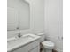 Modern bathroom featuring a white vanity with quartz countertop and a sleek sink at 379 Antioch St, Greenfield, IN 46140