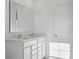 Bright bathroom featuring a double sink vanity with light countertops and a large mirror at 379 Antioch St, Greenfield, IN 46140