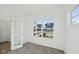 Sunlit bedroom with neutral carpet, ample windows, and white trim at 379 Antioch St, Greenfield, IN 46140
