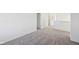 Carpeted bedroom with white doors and base trim and neutral walls at 379 Antioch St, Greenfield, IN 46140
