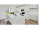 Modern kitchen featuring stainless steel appliances, white cabinetry, and a kitchen island at 379 Antioch St, Greenfield, IN 46140