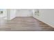 Spacious living room with beautiful wood-style flooring and bright, natural light at 379 Antioch St, Greenfield, IN 46140