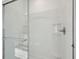 Clean, well-lit walk-in shower with glass door and built-in shelving at 379 Antioch St, Greenfield, IN 46140