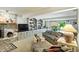 Finished basement with a fireplace, built-in shelving, and a comfortable seating area at 380 Raintree Dr, Zionsville, IN 46077