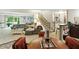 Spacious basement featuring a pool table, wet bar, and comfortable seating area at 380 Raintree Dr, Zionsville, IN 46077