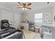 Bedroom features a ceiling fan, two bassinets, storage, and ample space for new beginnings at 3843 Grove Tree Ln, Indianapolis, IN 46203