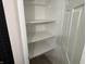 Bright closet with solid shelving providing plenty of storage space at 3906 N Lanewood Dr, Muncie, IN 47304