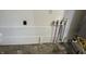 Water hookups in the garage of the home at 3906 N Lanewood Dr, Muncie, IN 47304