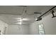 Garage ceiling with door opener and lighting fixtures at 3906 N Lanewood Dr, Muncie, IN 47304
