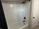 The bathroom features a clean, white tub and shower combination at 3906 N Lanewood Dr, Muncie, IN 47304