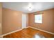 Bedroom with hardwood floors, and closet offering ample storage space at 45 Kirk E Dr, Indianapolis, IN 46234