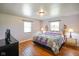 Charming bedroom with hardwood floors, natural light, and ornate furnishings at 45 Kirk E Dr, Indianapolis, IN 46234