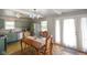 Kitchen-dining area boasts stainless appliances, classic cabinetry, and bright natural lighting at 45 Kirk E Dr, Indianapolis, IN 46234