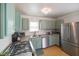 Well-lit kitchen with stainless steel appliances and modern fixtures at 45 Kirk E Dr, Indianapolis, IN 46234
