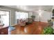 Inviting living room with hardwood floors, large windows, and comfortable seating arrangement at 45 Kirk E Dr, Indianapolis, IN 46234