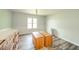 Bright bedroom with natural light, wainscoting, wood-look floors, and ample space for furniture at 4644 E 150 N, Anderson, IN 46012