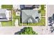 Aerial view of the backyard with patio, grill, fenced yard, and surrounding neighborhood at 4721 Carrollton Ave, Indianapolis, IN 46205