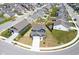 Expansive aerial view of a blue two-story home in a suburban neighborhood with well-maintained lawns at 507 Redvine Dr, Sheridan, IN 46069