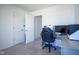 Bedroom with neutral carpet, white walls and a desk area; perfect for relaxing or studying at 507 Redvine Dr, Sheridan, IN 46069