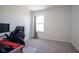 This carpeted bedroom offers a quiet retreat with a window for natural light and fresh air at 507 Redvine Dr, Sheridan, IN 46069