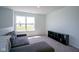 Bright, open loft featuring a comfortable couch and a modern storage unit, bathed in natural light at 507 Redvine Dr, Sheridan, IN 46069