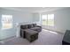 Inviting loft area with comfortable seating and natural light, perfect for relaxation and entertainment at 507 Redvine Dr, Sheridan, IN 46069