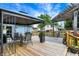 Backyard deck with gazebo, seating, and pergola, perfect for outdoor entertaining at 5821 Pemberly Dr, Indianapolis, IN 46221